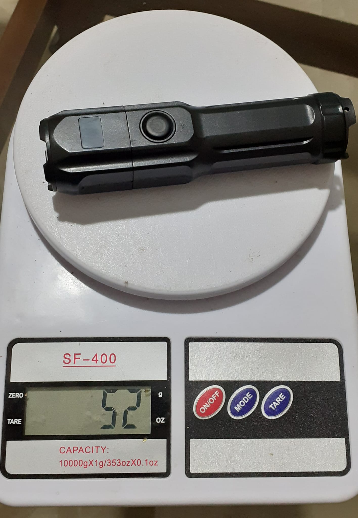 Smiling Shark Torch LED Light front view
feather weight