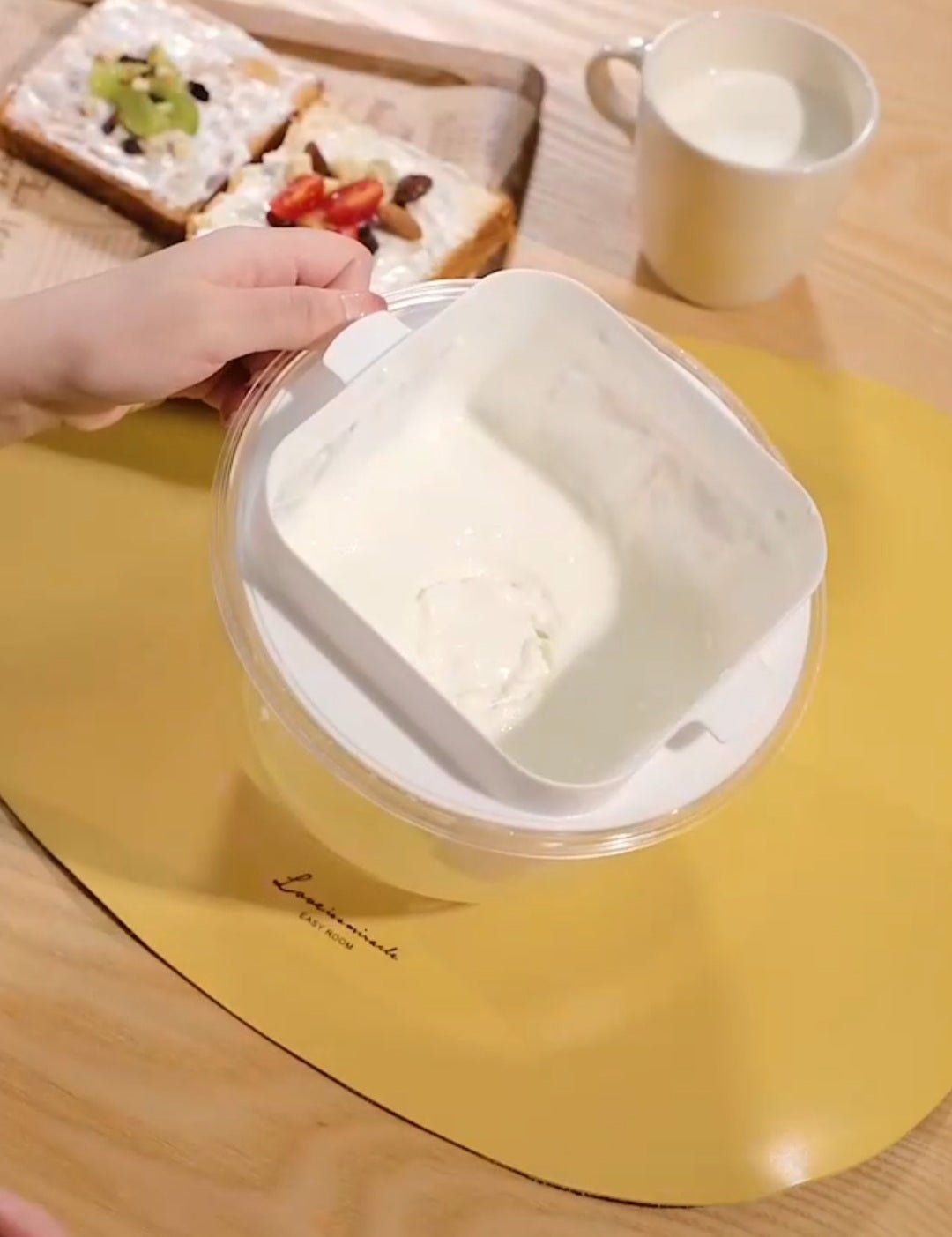 Close-up showing yogurt being strained