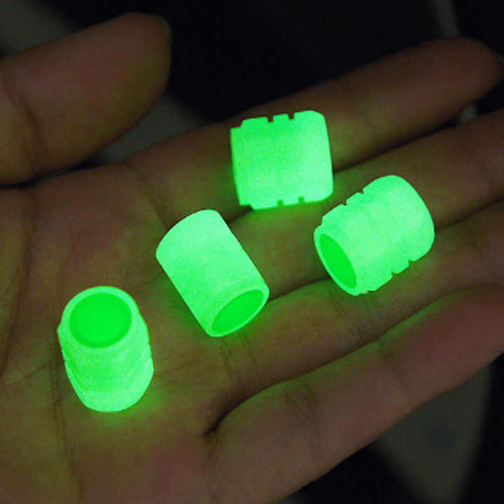 Phosphorescent wheel valve covers glowing at night
Set of 4 valve covers in green color